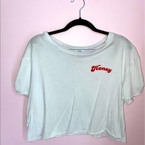 Cropped white “Honey” t-shirt from Garage. Size: Large